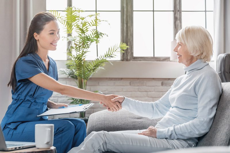 riverview-hospice-and-palliative-care-nurse-visiting-patient Riverview Hospice and Palliative Care LLC | Nurse meeting with an older woman as a patient